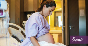 Pregnant woman on hospital bed